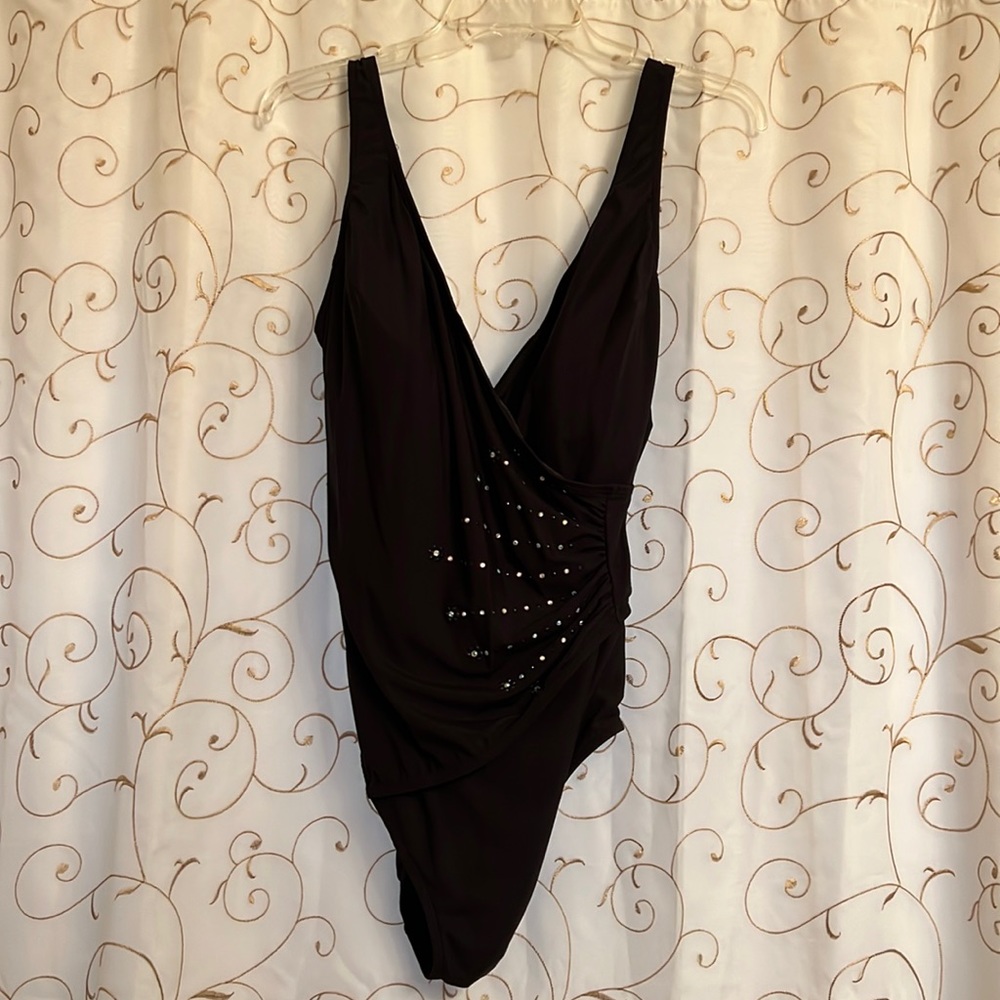 Black one piece bathing suit, Size 16. Low cut back